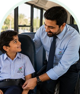 School staff assisting a student on the school bus