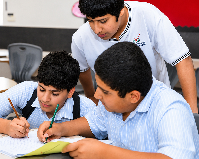 Boys Division students working together in class