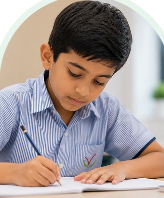 School of Modern Skills student writing in class
