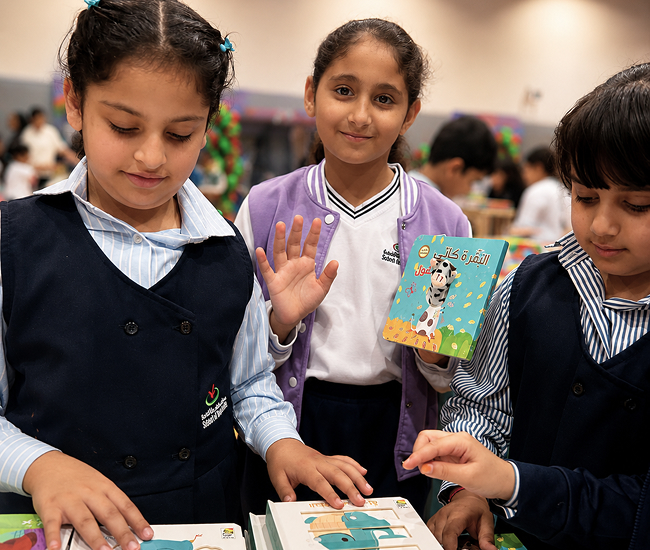 Students reading together during language learning