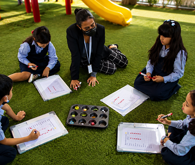 Students receiving academic intervention outdoors