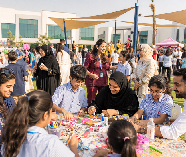Students, families, and educators enjoying a school community event